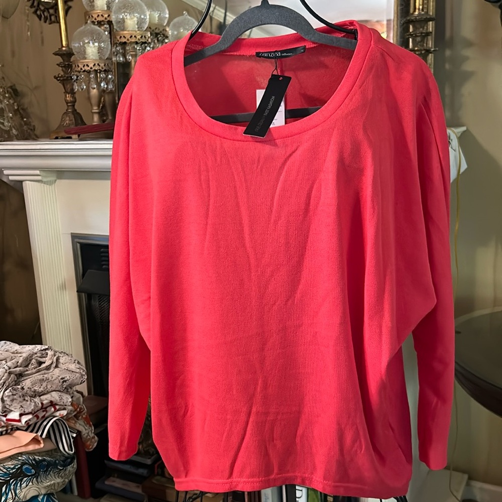 Coral colored high low . Batwing sleeve